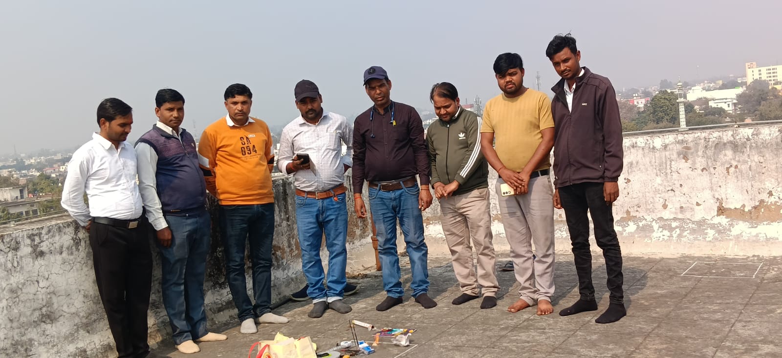 Raelestia team conducting rooftop site survey